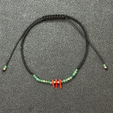 Lucent Coral Emerald Cord Bracelet